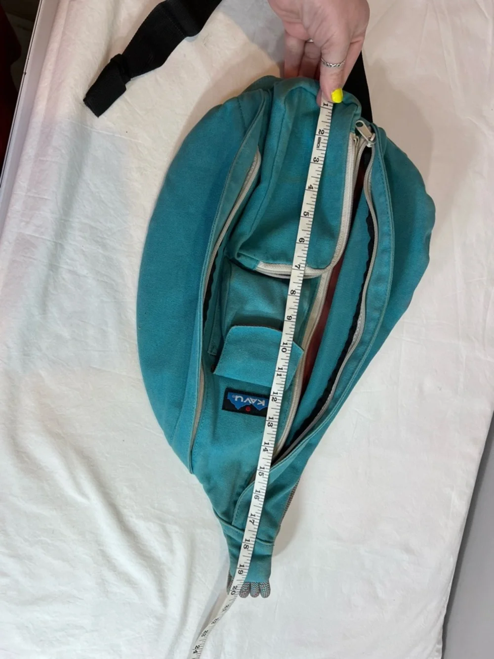 Kavu teal rope sling bag backpack